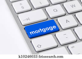 Keyboard with one blue button with the word mortgage