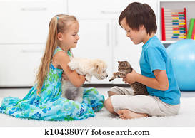 Kids with their pets - dog and cat Kids with their pets - dog and cat