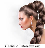 Long Healthy Hair. Beautiful Woman Portrait with Long Brown Hair