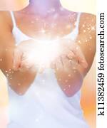 magic twinkles on female hands magic twinkles on female hands