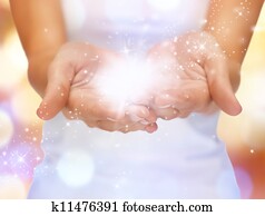 magic twinkles on female hands magic twinkles on female hands