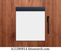 Notepad with pen on desk Notepad with pen on desk