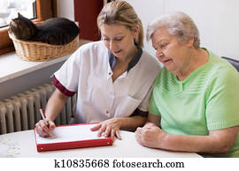 nurse visiting a patient at home