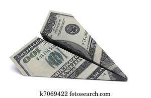 paper airplane from the dollars on a white background