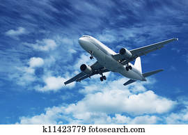 Passenger air plane on blue sky Passenger air plane on blue sky