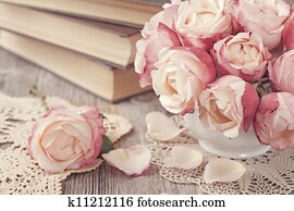 Pink roses and old books Pink roses and old books