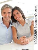 Portrait of father and girl in real-estate agency