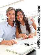 Portrait of father and girl in real-estate agency