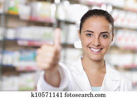 Portrait of Smiling Woman Pharmacist in Pharmacy Portrait of Smiling Woman Pharmacist in Pharmacy