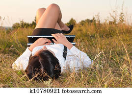  Pretty young woman outdoor with computer