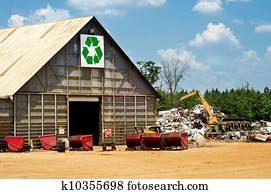 Recycling center with scrap yard and heavy machinery Recycling center with scrap yard and heavy machinery