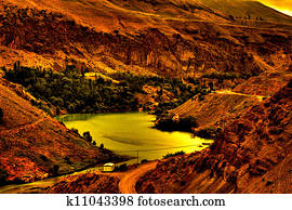 river flowing through mountains river flowing through mountains