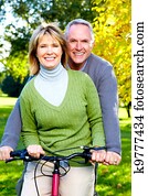 Senior couple cycling