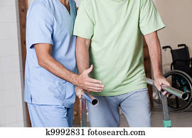 Senior Man having ambulatory therapy Senior Man having ambulatory therapy