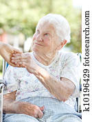 Senior Woman Holding Hands with Caretaker Senior Woman Holding Hands with Caretaker