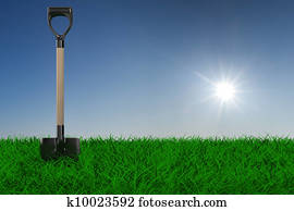 Shovel on grass. garden tool. 3D image Shovel on grass. garden tool. 3D image