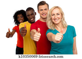 Smiling group of people with thumbs up gesture