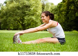 Stretching exercise - sport woman outdoor