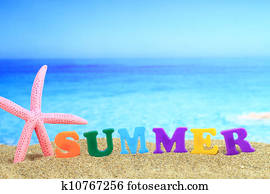 Summertime. The word ?summer? on the beach
