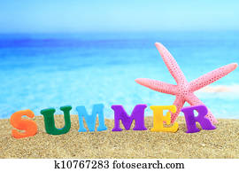 Summertime. The word ?summer? on the beach