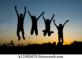 sunset happy people jumping