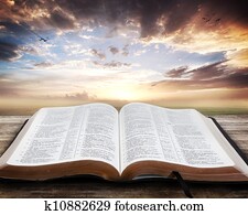 Sunset with open Bible