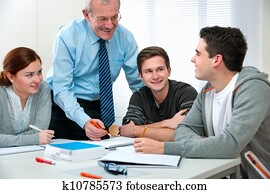 Teacher with students in classroom Teacher with students in classroom