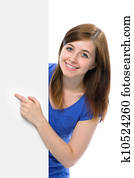 teenage girl points her finger at a blank board