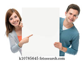 teenagers holding at a blank board