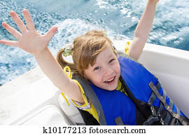 Travel of children on water in the boat