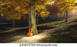 Violin in autumn park Violin in autumn park