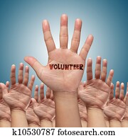 volunteer group raising hands 