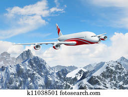 White passenger plane above the mountains White passenger plane above the mountains