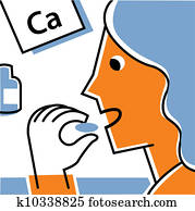 Woman eating calcium supplement Woman eating calcium supplement