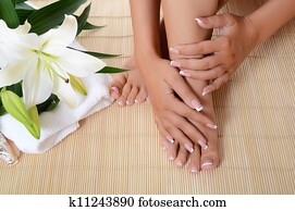 Woman hand and feet with manicure Woman hand and feet with manicure