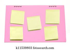 Yellow memo stick on Pink calendar 