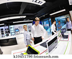 Young couple in consumer electronics store