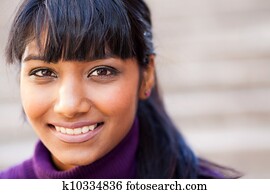 young indian woman face closeup young indian woman face closeup