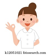 A female nurse showing ok A female nurse showing ok