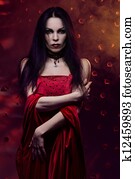 Beautiful vampire woman in red dress Beautiful vampire woman in red dress