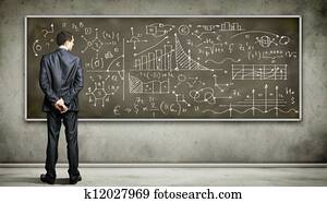 Business person against the blackboard
