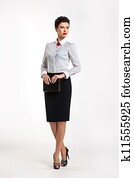 Confident entrepreneur woman in business suit in office Confident entrepreneur woman in business suit in office