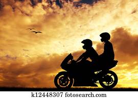 couple on a motorcycle couple on a motorcycle