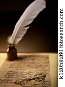 Glasses and inkwell on an old letter Glasses and inkwell on an old letter