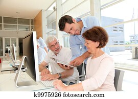 Group of senior people in business training