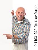 happy smiling senior man holds a blank board