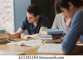 People sitting at the table doing homework