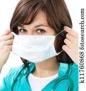 Portrait of a woman wearing doctor uniform