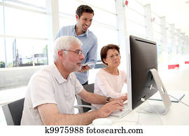 Senior people attending business training Senior people attending business training