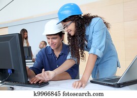 Students engineers working on project